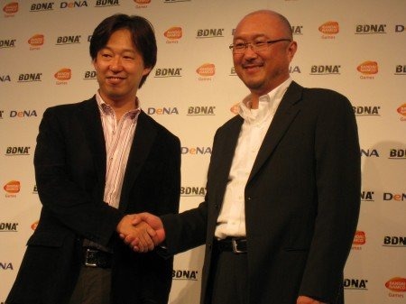 15日、株式会社バンダイナムコゲームスと株式会社ディー・エヌ・エー（以下DeNA）が、東京ゲームショウ2011のバンダイナムコブース内にて、10月に共同設立する新会社「BDNA」のプレス発表会を開催しました。