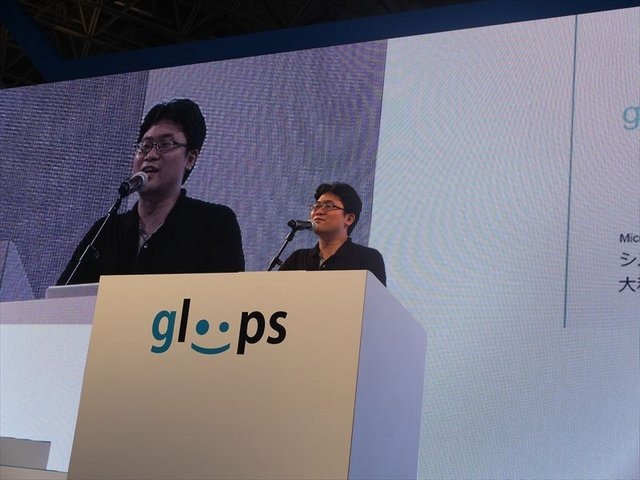 東京ゲームショウ、ビジネスデイ１日目の9月20日に株式会社gloopsのブースでは12時から「gloopsのゲームの作り方」と題されたイベント講演が行われました。システム事業部サーバーエキスパートの大和屋貴仁氏がgloopsの日々変化していくソーシャルゲーム作りについて説